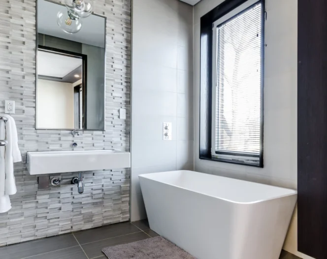 bathroom with bath tub and sink